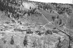 1935 - The original Baldytown located on Baldy Mountain's East face. Shortly after the end of the Civil War, the surrounding area saw a flood of eager miners looking to profit off of the mountain's gold and copper rush. Another settlement known as Elizabethtown was founded on the mountain's west face and a number of decommissioned mine shafts remain to this day.